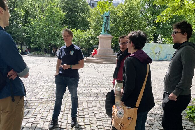 2-Hour Essential Oslo in the City Center Guided Walking Tour - Royal Palace from a distance, tradition seen in a single glance