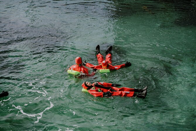 2 Hours Urban Arctic Floating Activity in the Harbours of Tromsø - Getting suited up: what the immersion suit setup really means