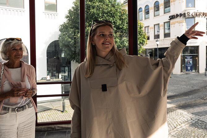 3 Hour Guided Food Walk Tour in Alesund, Norway - Stop 3: Kongens gate, the Pavilion View, and Town Stories