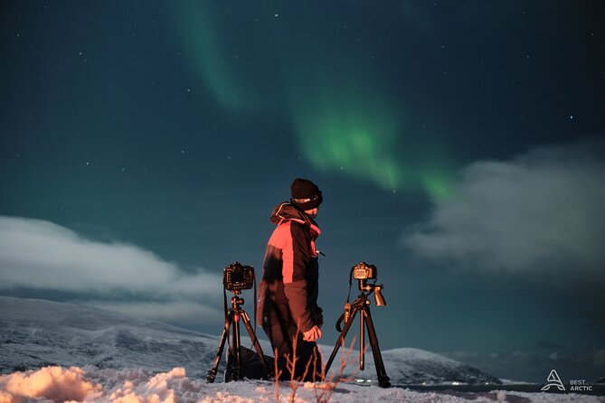 Aurora Safari Chase by big bus, free Photos, toilet onboard - Starting at Tromsø Havn Prostneset: the night begins fast