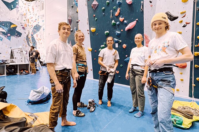 Climbing in Mørkvedhallen Klatresenter - Rope climbing and bouldering zones, plus the route setting vibe