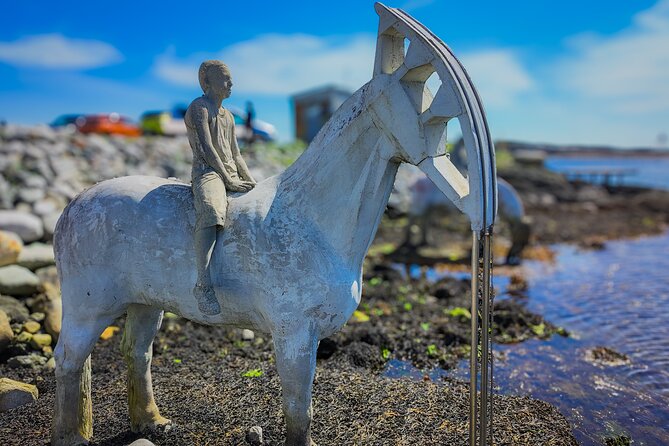 Discover Haugesund with the locals, visit the rising tides - Kvalsvik Rising Tide Sculptures: Sea Art With an Oil-Era Message
