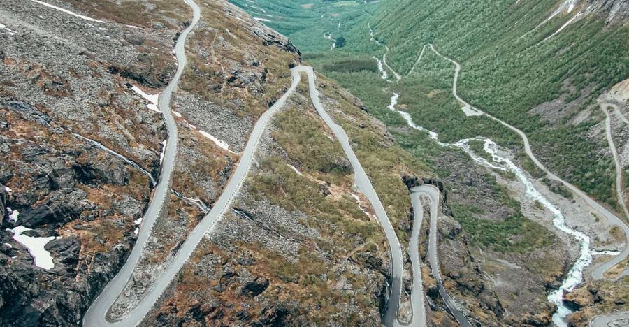 From Ålesund: Trollstigen Sightseeing Village & Fjord Tour - Kokarsteinen and the Storfjord photo stop: your first big view