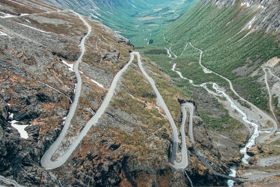 From Ålesund: Trollstigen Sightseeing Village & Fjord Tour - Stigefossen waterfall: timing your photos when the mist rolls in