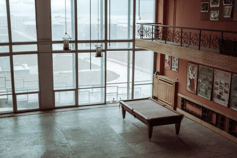 From Longyearbyen: Pyramiden Private Photo Tour w/ Transfer - Soviet time capsule: walking Pyramiden’s architecture for real photos