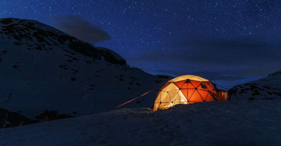 From Skjeggedal: Trolltunga Sunset Winter Overnight tour - The base camp moment that saves your legs