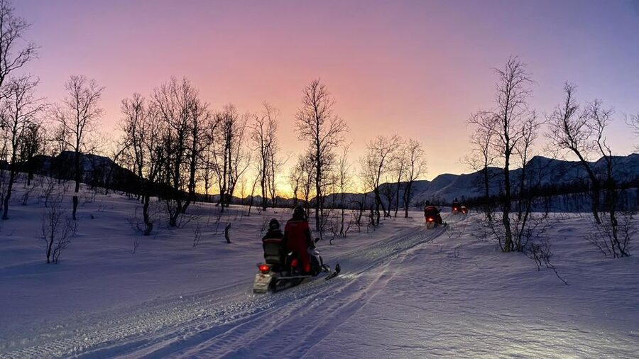 From Tromso: Eco Luxury Snowmobile Adventure to Lyngen Alps - Camp Troll E: getting kitted up like you mean it