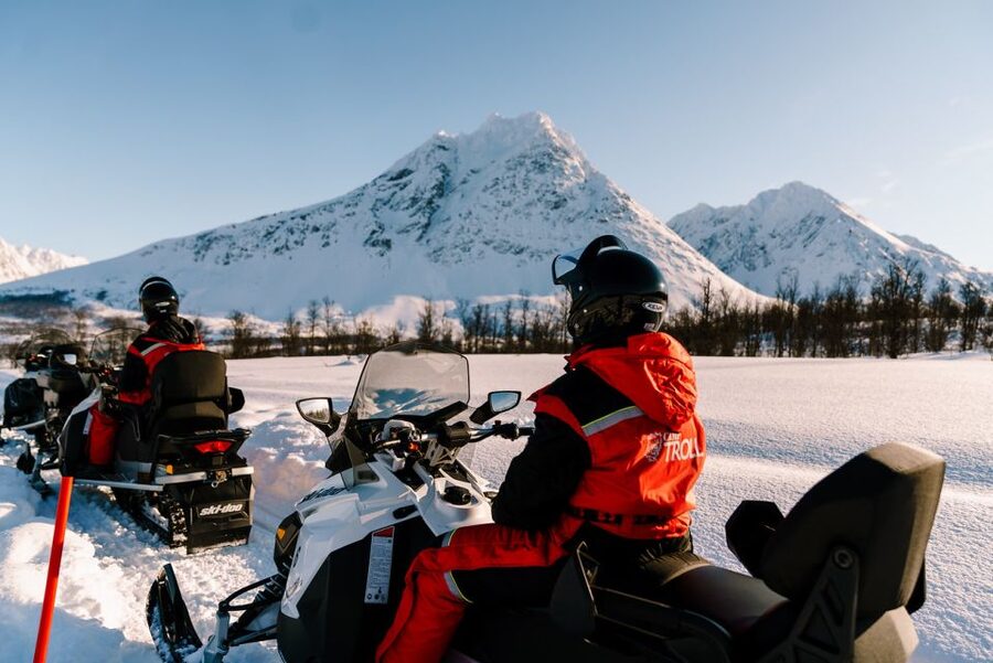 From Tromso: Eco Luxury Snowmobile Adventure to Lyngen Alps - Lunch by open fire: warm food, local soup, and troll stories
