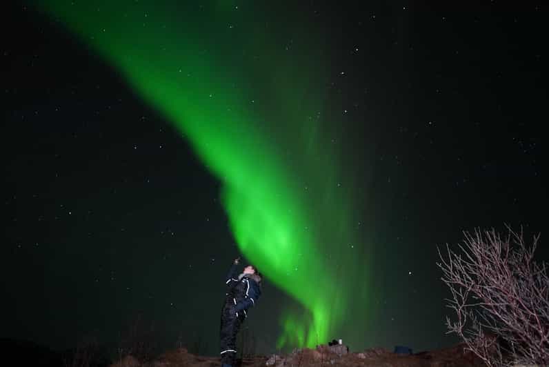 From Tromsø: Northern Lights Tour with Hot Drinks and Photos - The cold-weather kit: warm suits, spikes, head lamps