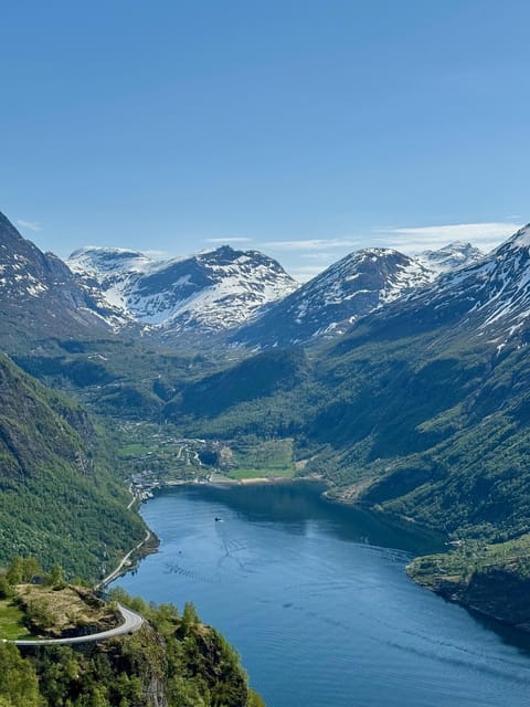 Geiranger Dalsnibba: mini bus tour - Where You Start: Geiranger Pier, Joker Shop, and the Green Jacket