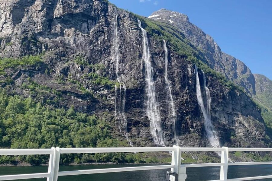 Geiranger Fjord Boat Tour with Waterfall Tasting - Getting close at the Friaren Waterfall water tasting stop