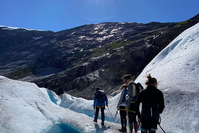 Glacier Hiking and Kayaking Tour on Nigardsbreen Glacier - Stepping Onto Nigardsbreen: Crampons, Rope, and Real Ice Time