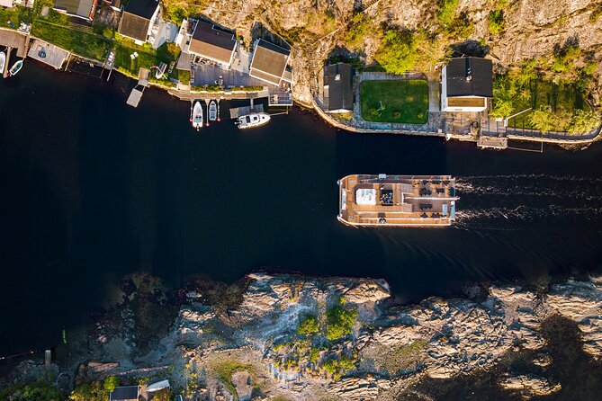 Guided Sightseeing Cruise on Oslofjord by Premium Silent Boat - Dyna Fyr: lighthouse, church, and restaurant on one rock