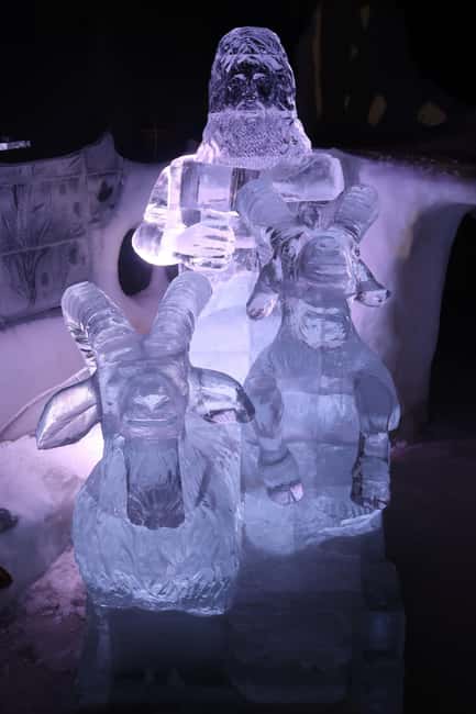 Lofoten: Magic Ice Bar Entry Ticket with Welcome Drink - Crystal-clear sculptures, LED lights, and an ice-slide for kids