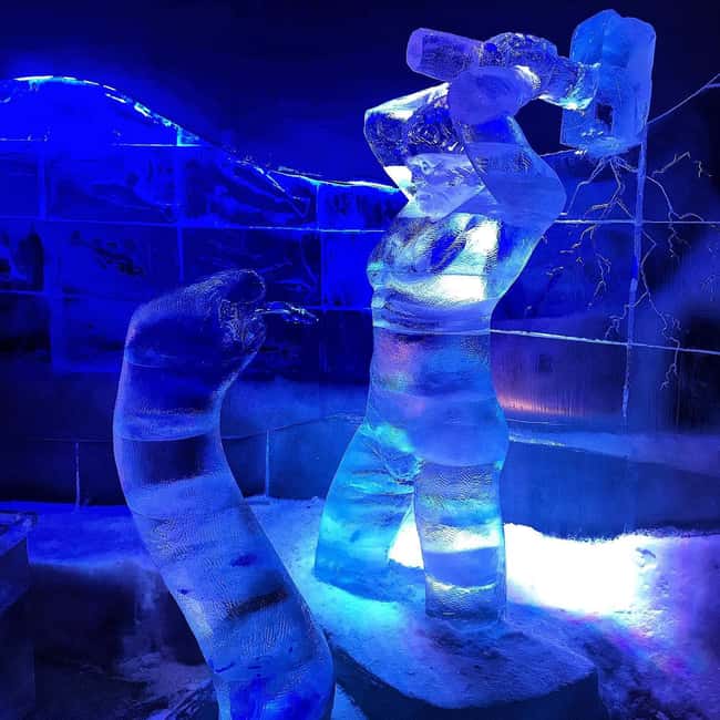 Lofoten: Magic Ice Bar Entry Ticket with Welcome Drink - Winter poncho and gloves: your comfort setup before the ice