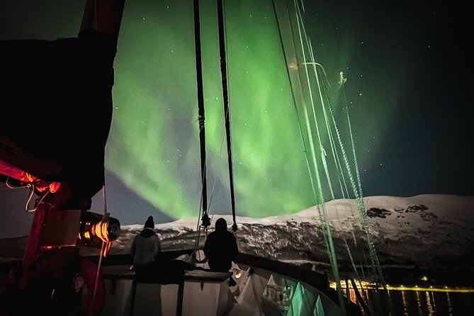 Luxury Northern Lights Yacht Cruise with Hot Tub from Tromsø - Stop 1: Tromsø at night, cruising for aurora with route flexibility