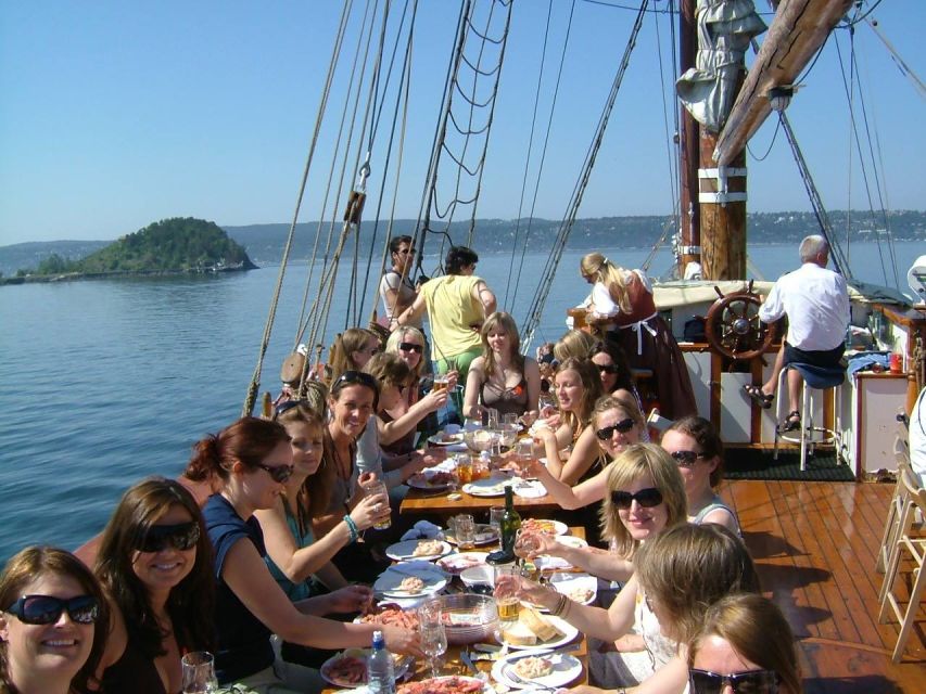 Oslo Fjord Evening Live Rock music cruise with Shrimp buffet - Boarding a Traditional Wooden Sailboat and Getting Ready