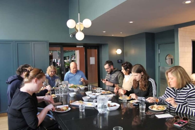 Oslo: Food Tasting and Walking Tour with a Local - Traditional Norwegian Dress Stop, Then Into Student and Hip Oslo