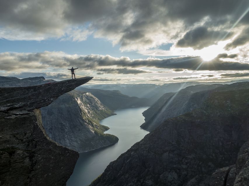 Overnight: Trolltunga Via Ferrata Sky Ladder Glamping - The payoff viewpoint, Trolltunga with Folgefonna in frame