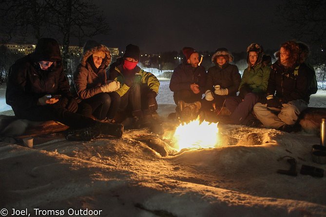 Snowshoe trip with a campfire in Tromso - Campfire break: warm drinks, lefse, and Tromsø stories