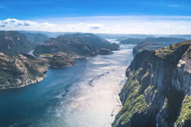 Stavanger: Waterfalls, Caves and Rock Tour By Sea - Vagabond’s Cave: Aqua Water, Tall Cliffs, and a Legend