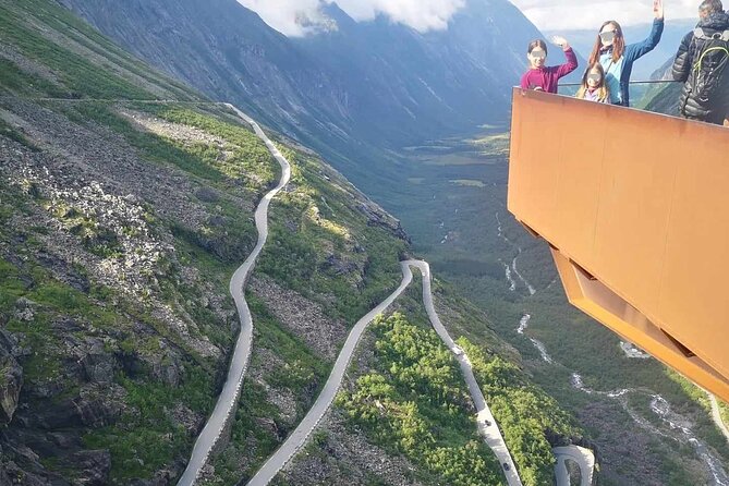 Trollstigen 100% Highlights Fjord to Troll 10 stops 16 seats max - The bus-window story at Sjøholt, plus Swiss-style hotel lore
