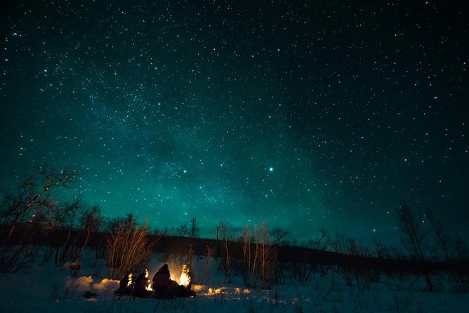 Tromso Aurora Hunt with Bonfire, Soup, Winter Gear & Transfers - The aurora chase: multiple viewpoints around Tromsø, with Finland as a backup move