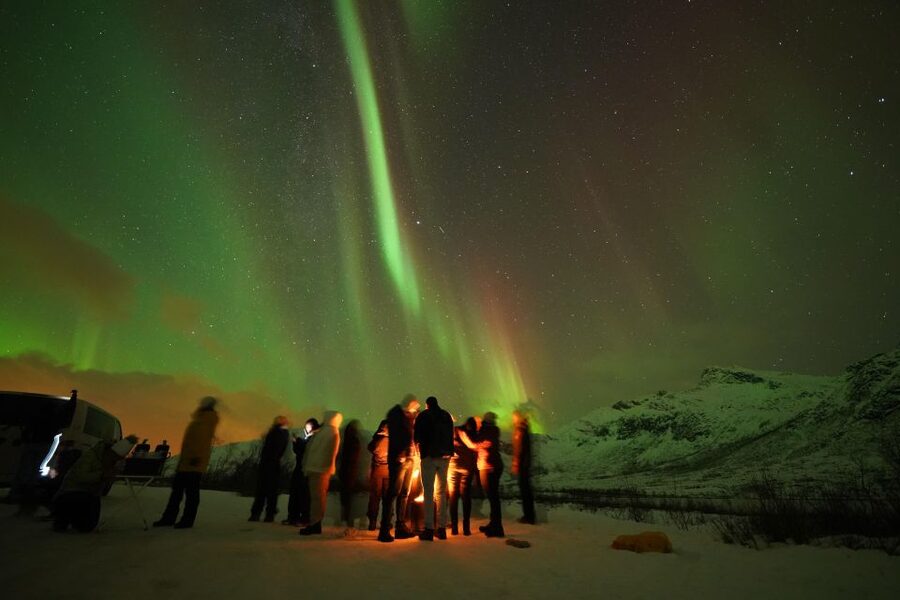 Tromsø: Chase Aurora in Minibus and Free Aurora Portrait - Guides Who Drive Like They Mean It