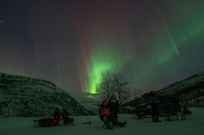 Tromsø: Express Aurora Hunt with Wandering Owl - How the guide hunts for gaps in the clouds