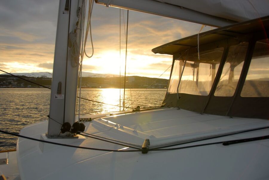 Tromsø: Midnight Sun Cruise in a Luxury Catamaran - Norwegian comfort on board: thermal suits, coffee, and fish soup