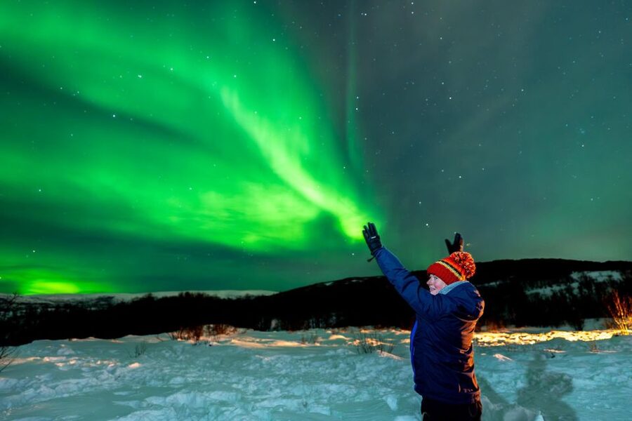 Tromsø: Northern Lights Chase with Photos and Bodysuits - Meeting point and getting kitted: thermal suits, what to bring, and what is not provided