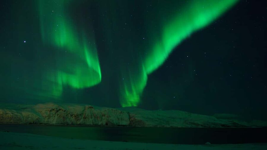 Tromsø: Northern Lights Tour in Glass Minibus with Dinner - How the route hunt for clear skies actually works