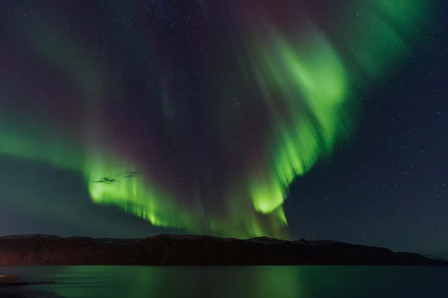 Tromsø: Northern Lights Tour with Local Stories & Photos - Tromsø sightseeing breaks up the chase