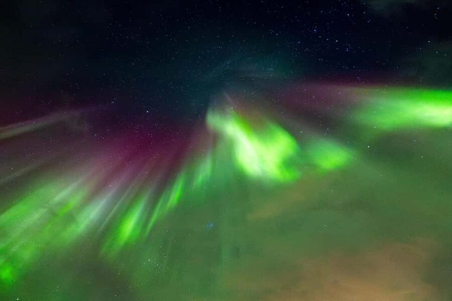 Tromsø: Northern Lights Tour with Local Stories & Photos - Hot drinks, biscuits, and waiting without cabin fever